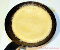 Rezept für schnellen Eierkuchen - Zum Wenden fertiger Eierkuchen in einer Panne aus Eisenguss